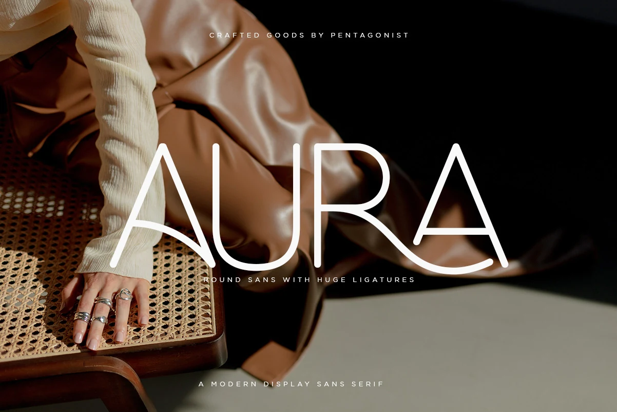 Aura Font preview with rounded sans letters and oversized ligature curves