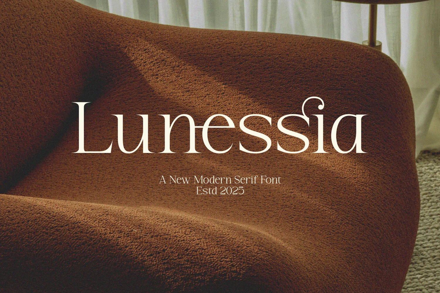 Lunessia Font preview with white modern serif lettering, slim strokes, and a curled detail