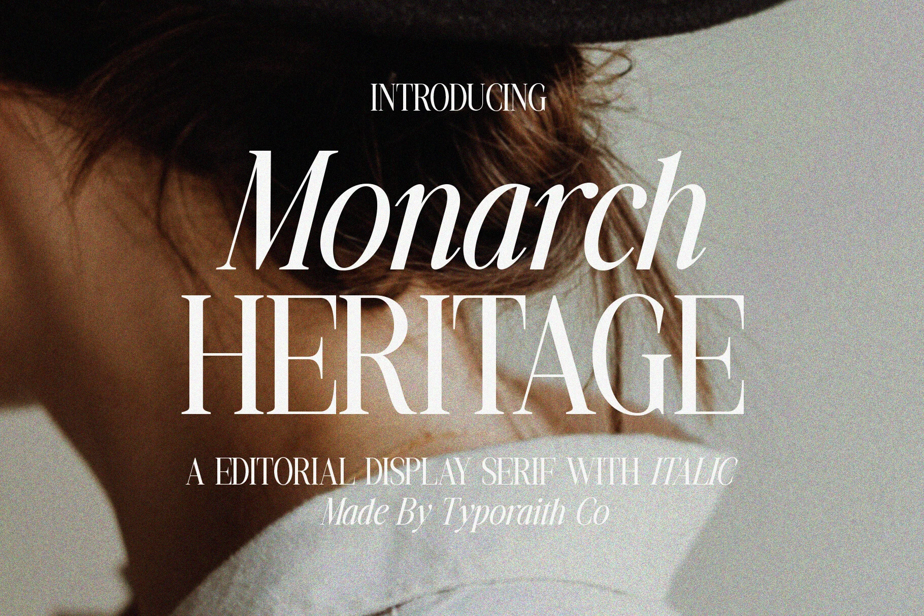 Monarch Heritage Font preview with high-contrast serif lettering in italic and Roman styles