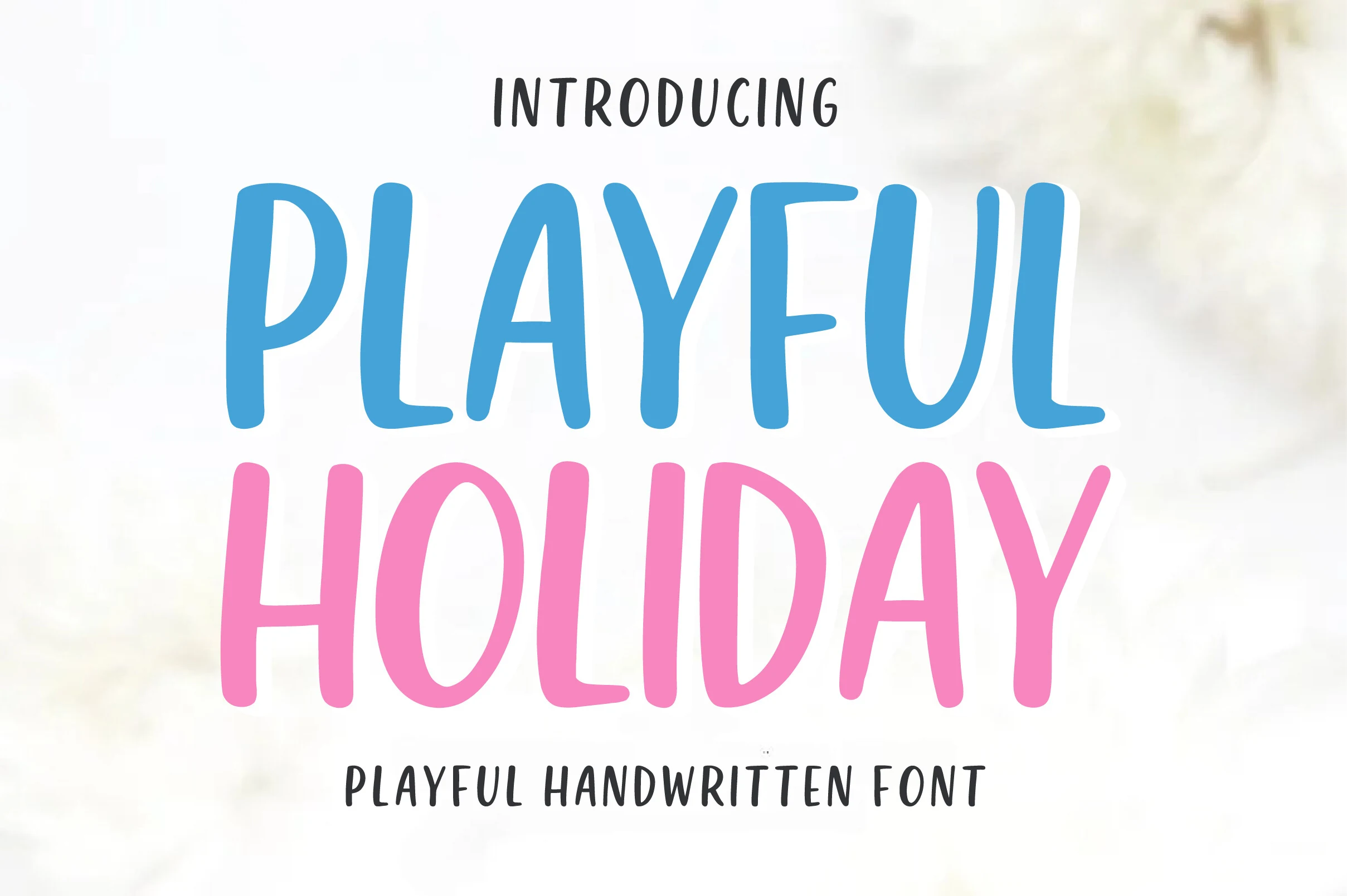 Playful Holiday Font preview with rounded blue and pink handwritten uppercase lettering