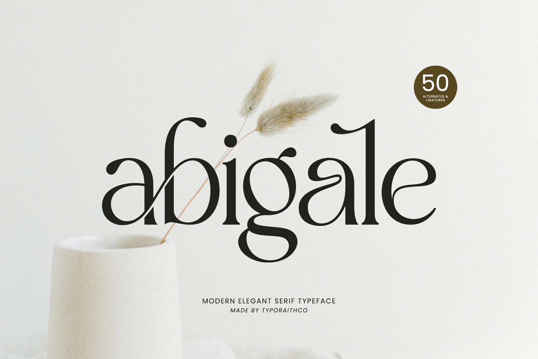 Abigale Font preview with elegant black serif lettering, sweeping curves, and decorative ligature details