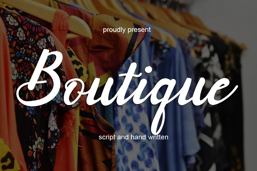 Boutique Font preview with smooth white handwritten script and flowing connected strokes