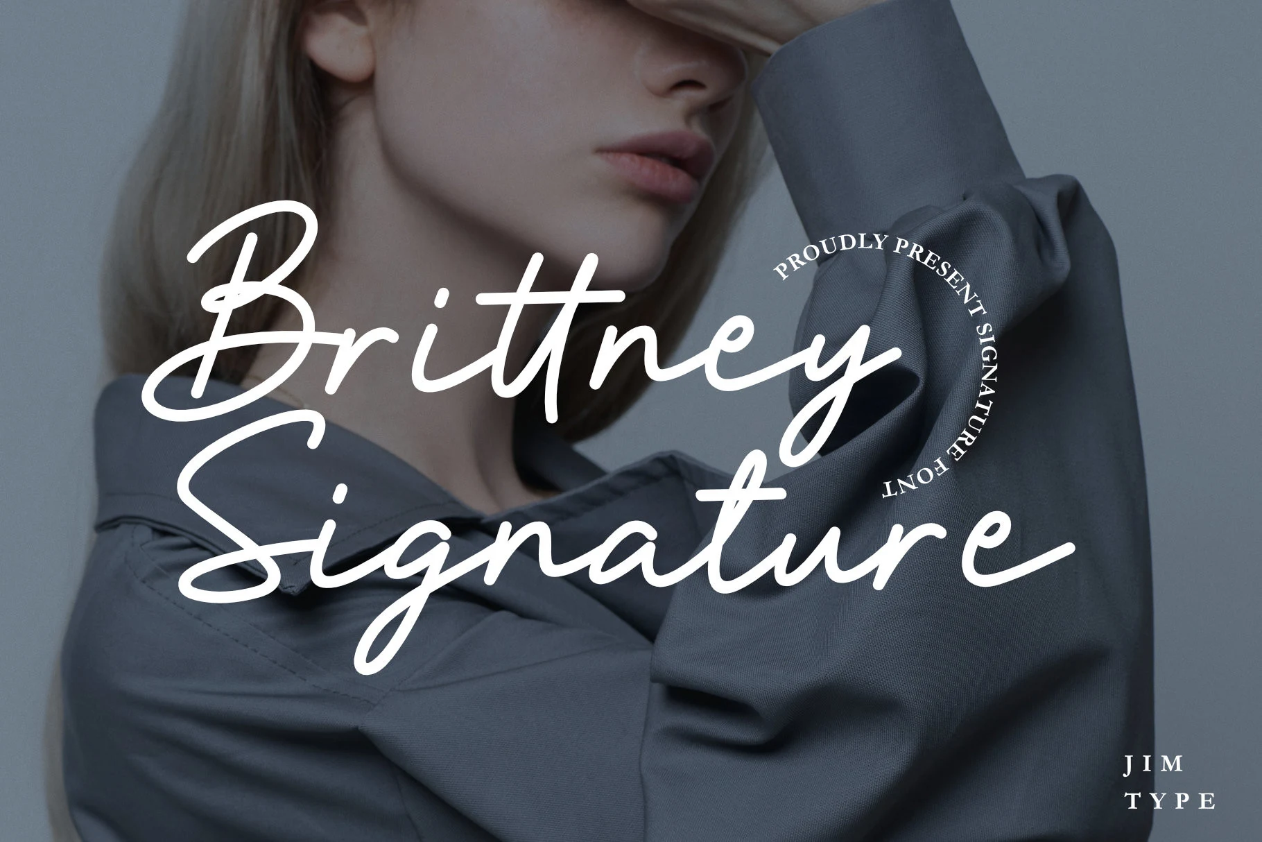 Brittney Signature Font preview in white flowing signature script with rounded strokes and long swashes