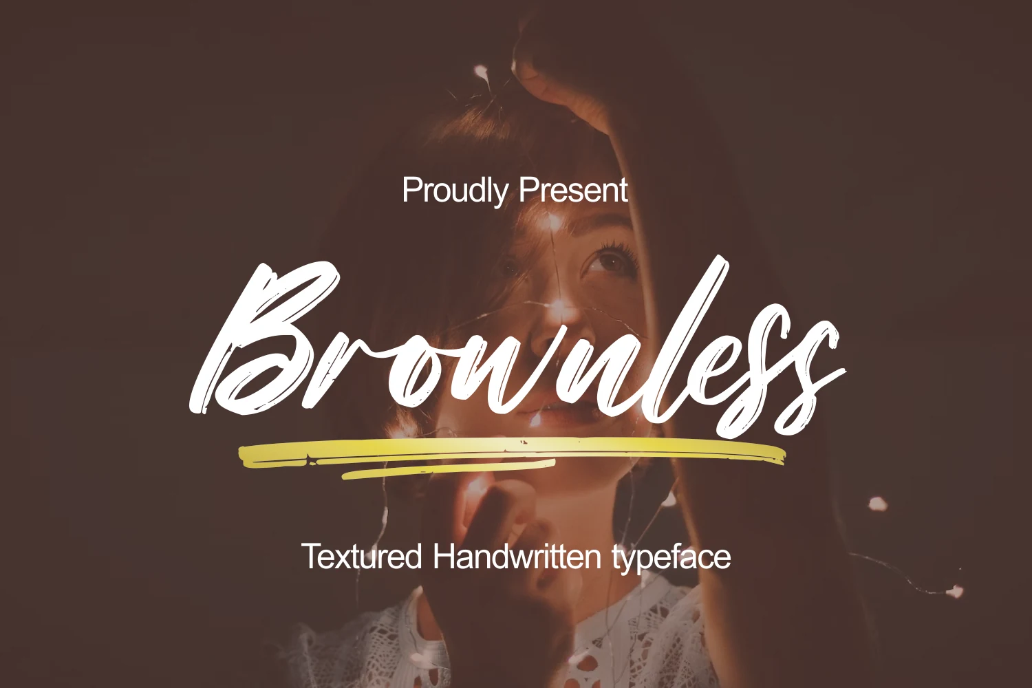 Brownless Font preview with white textured brush-script lettering, connected strokes, and dry ink details