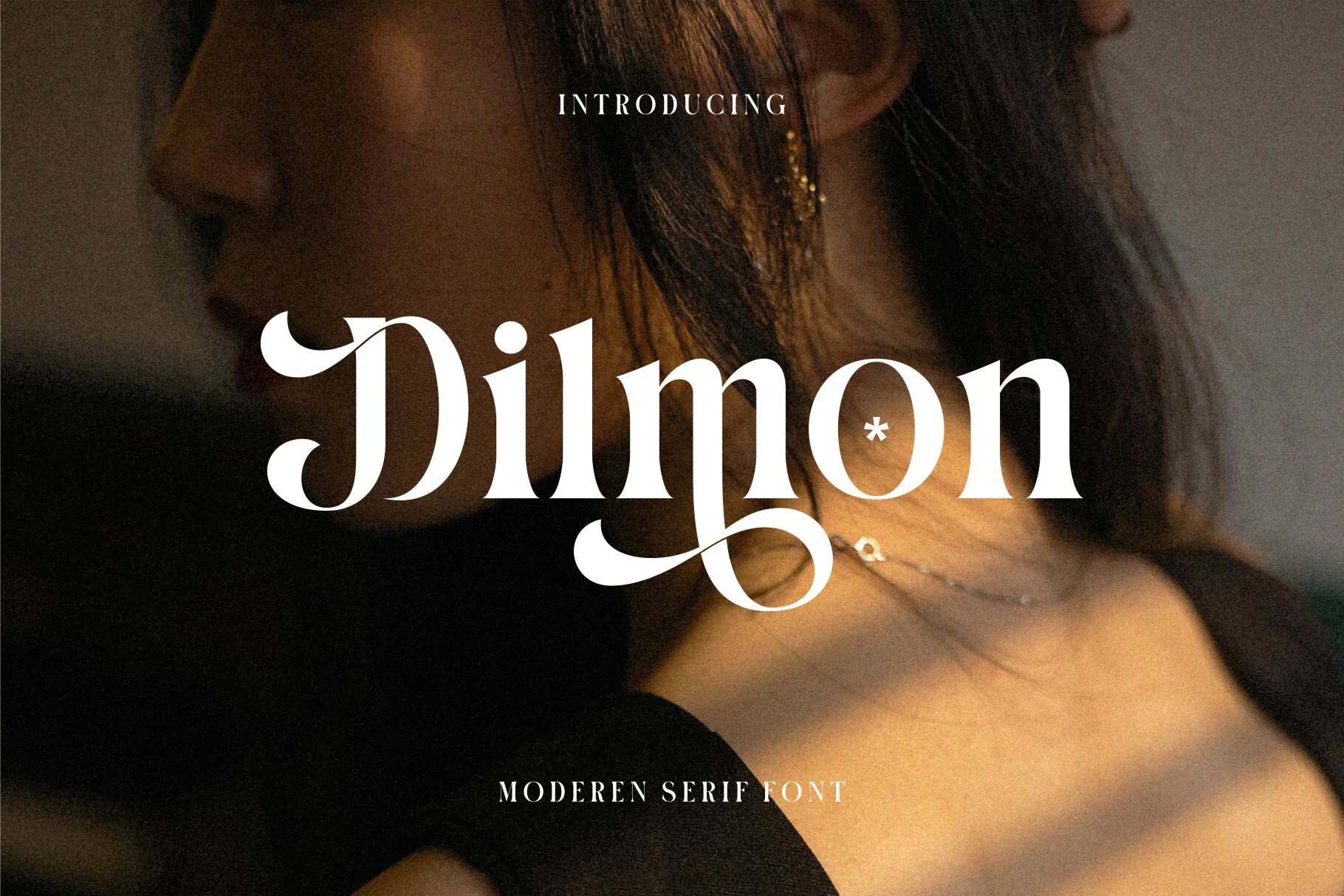 Dilmon Font preview with elegant retro serif lettering, high contrast, and sweeping swashes