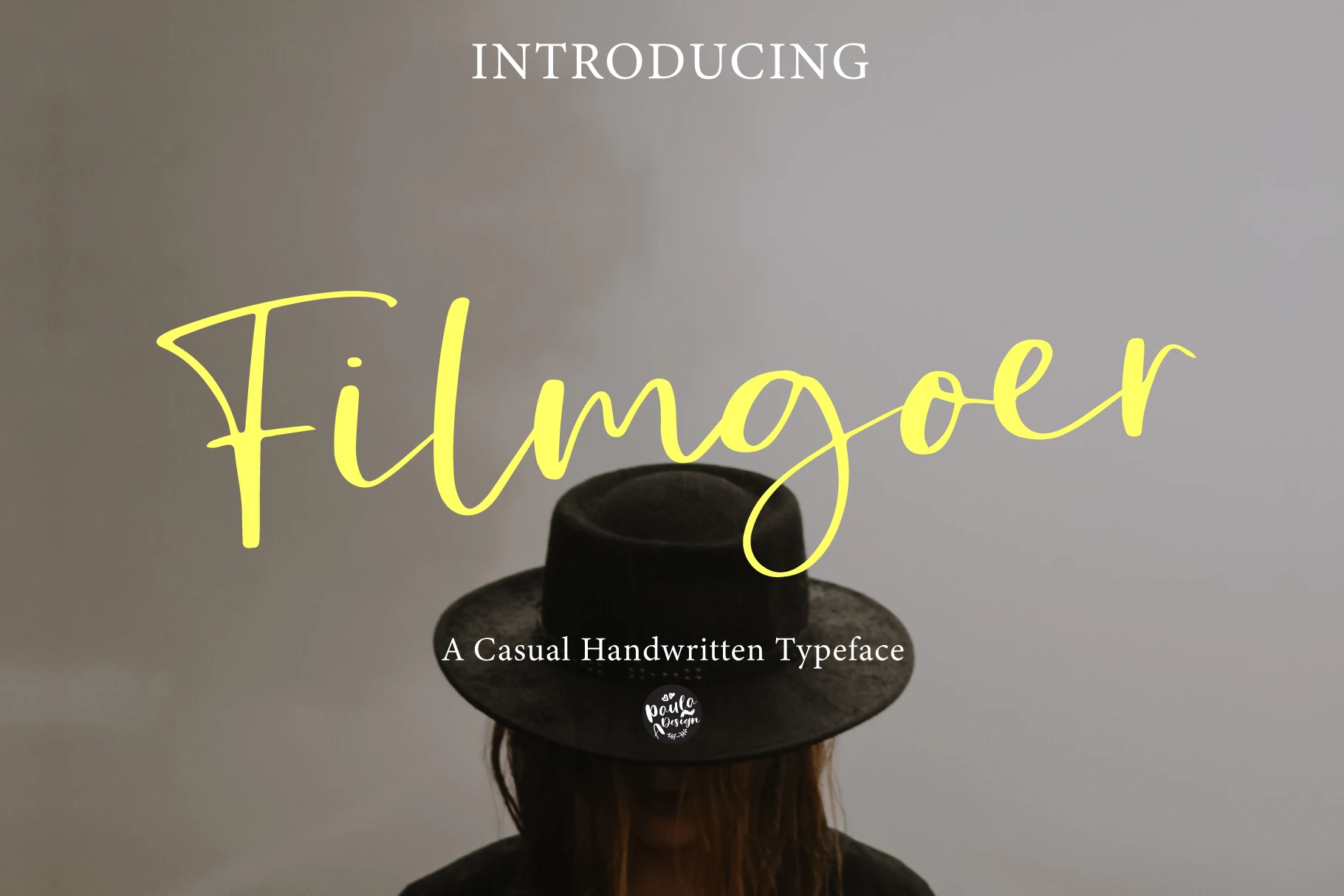Filmgoer Font preview in bright yellow casual handwritten script with flowing loops