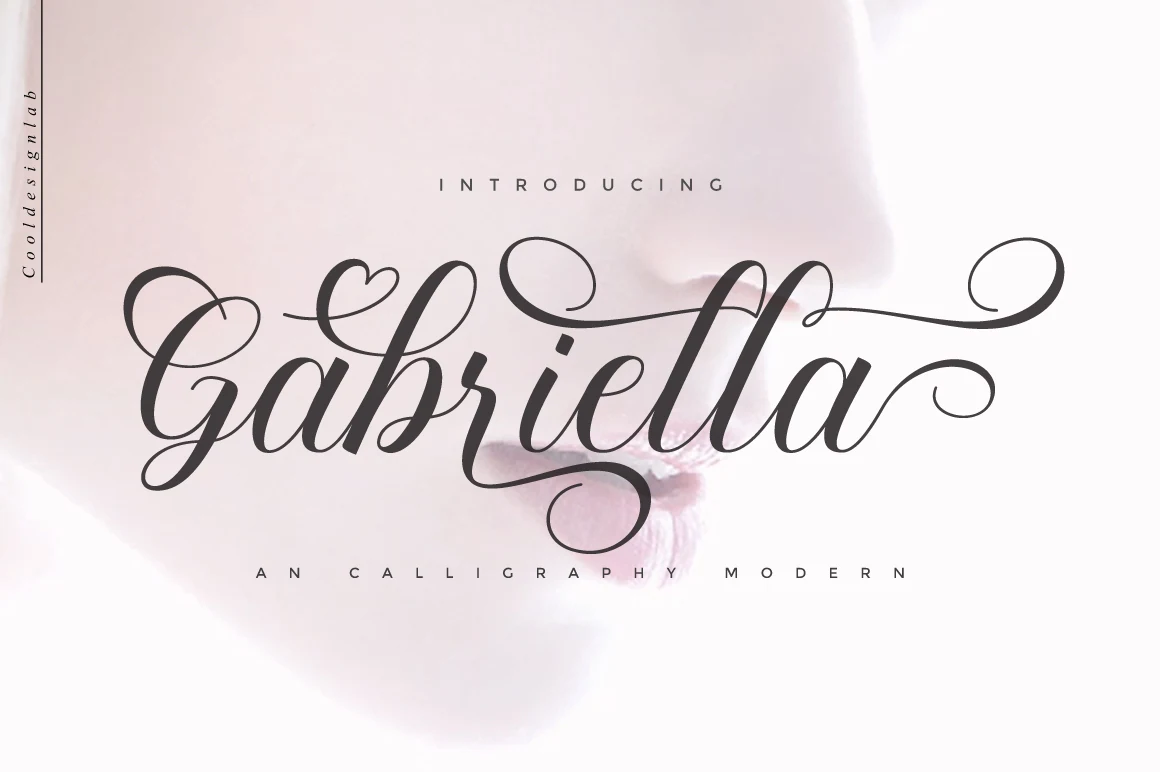Gabriella Script Font preview with flowing calligraphy letters, heart-shaped flourish, and long elegant swashes