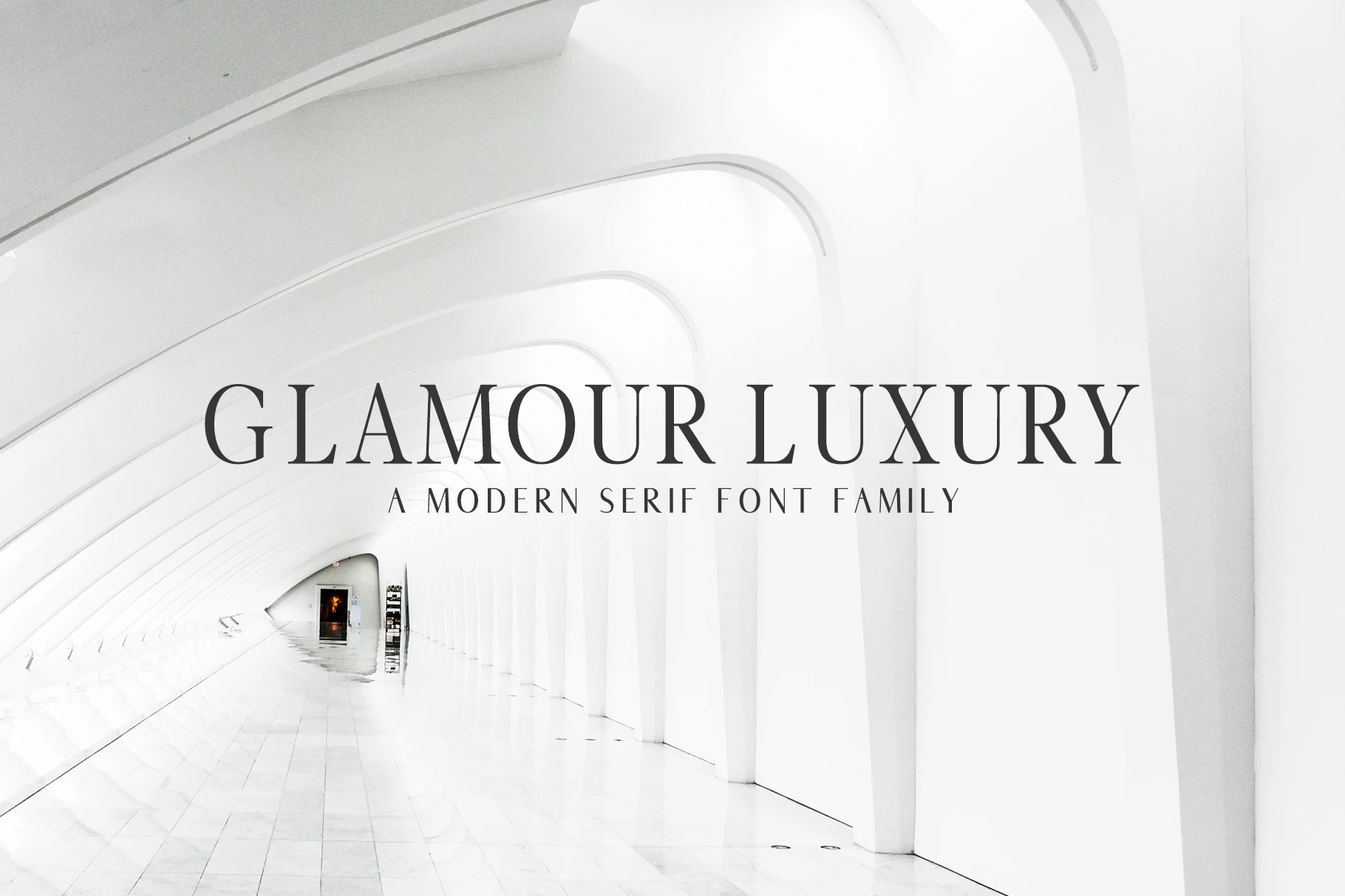 Glamour Luxury Family Font preview with tall uppercase serif lettering and clean minimalist styling