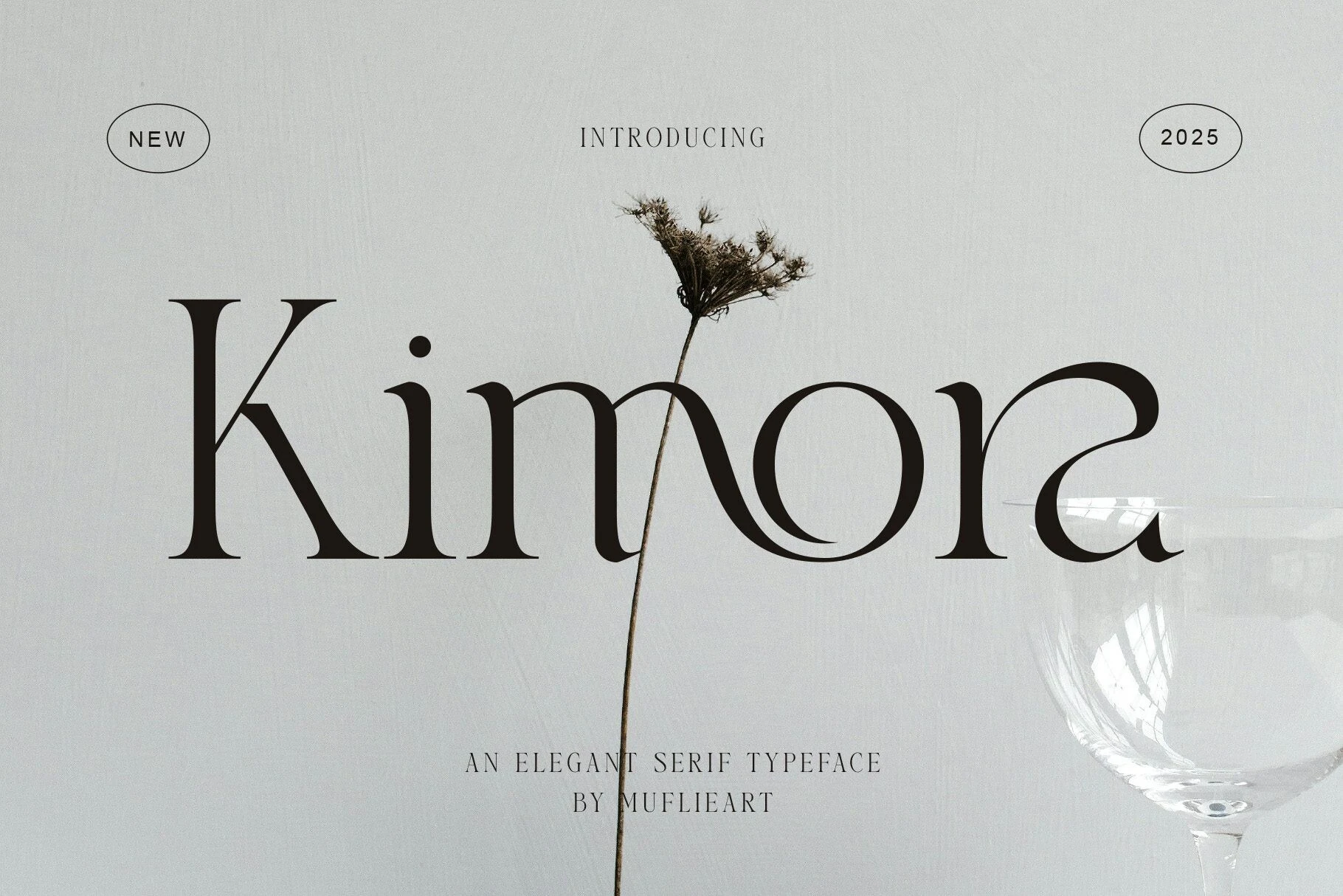 Kimora Font preview with elegant black serif lettering, high contrast, and fluid ligature curves