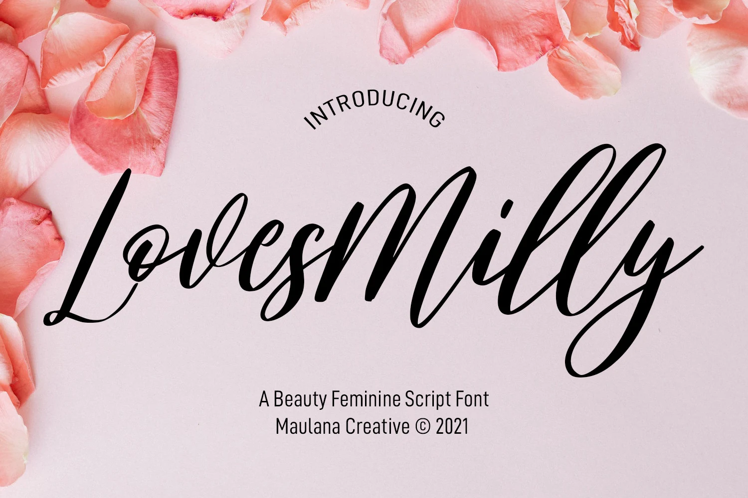 Lovesmilly Feminine Font black flowing script with tall loops and high contrast strokes