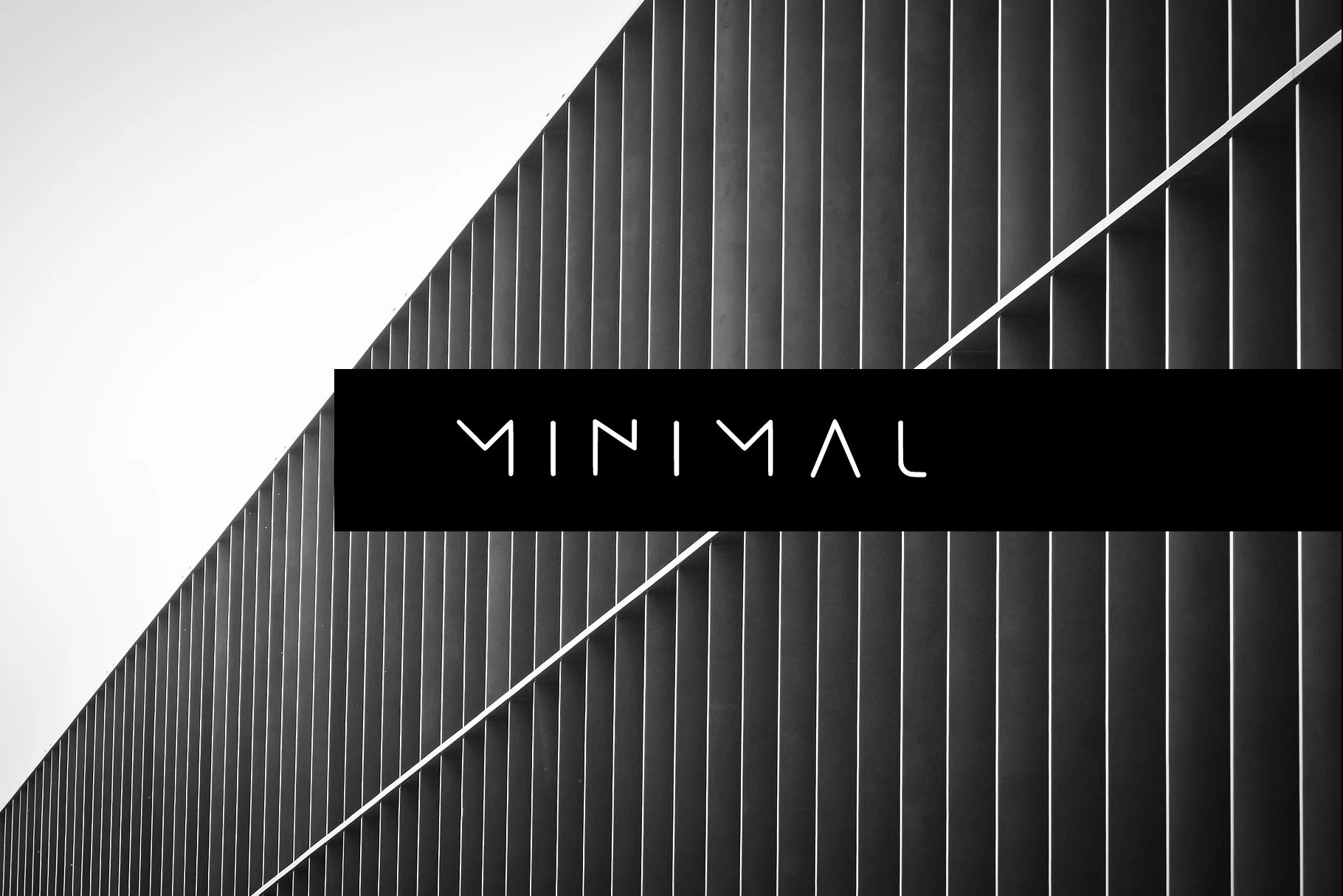 Minimal Font preview with slim futuristic white sans serif lettering
