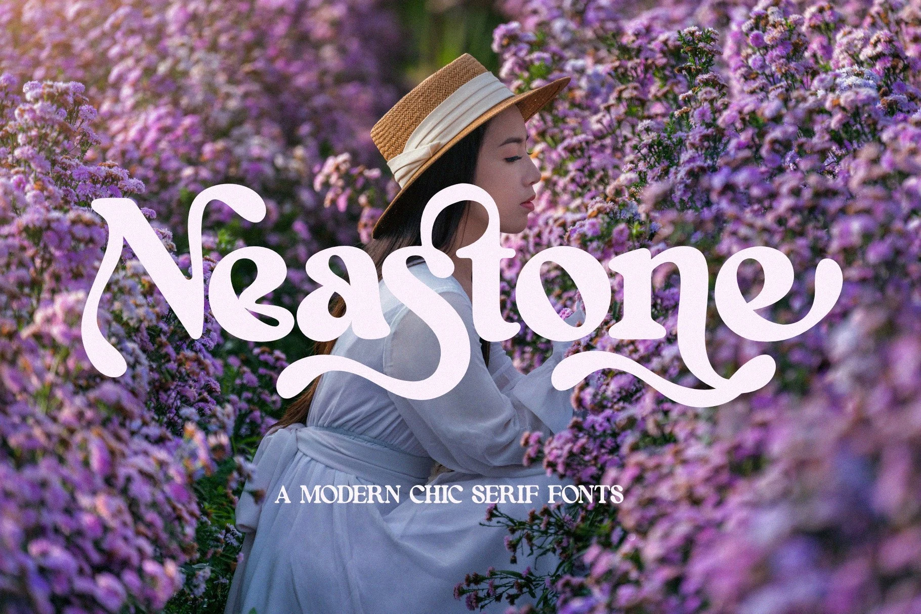 Neastone Font preview with soft white decorative serif lettering and rounded curves