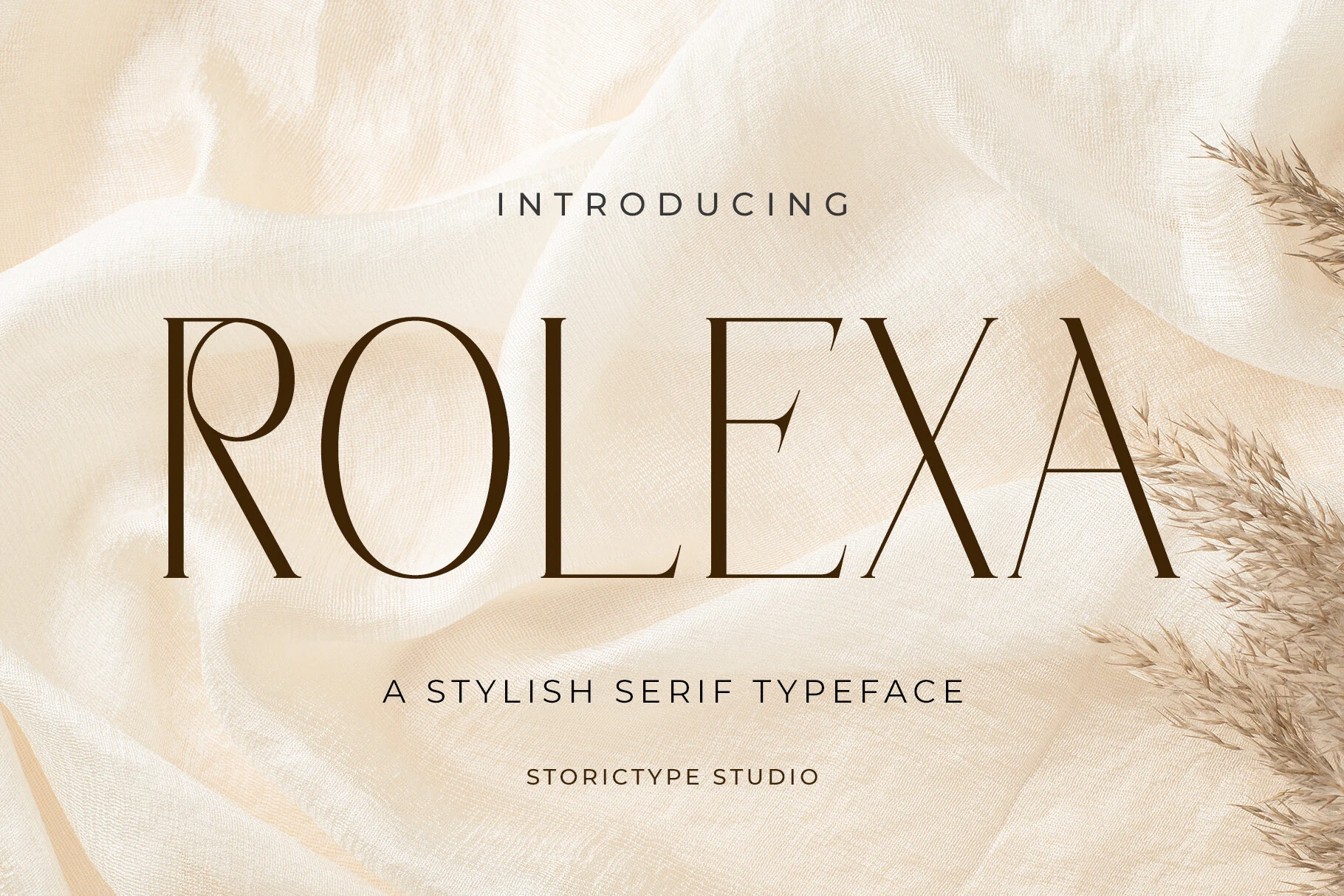 Rolexa Font preview with tall high-contrast serif capitals and thin elegant strokes