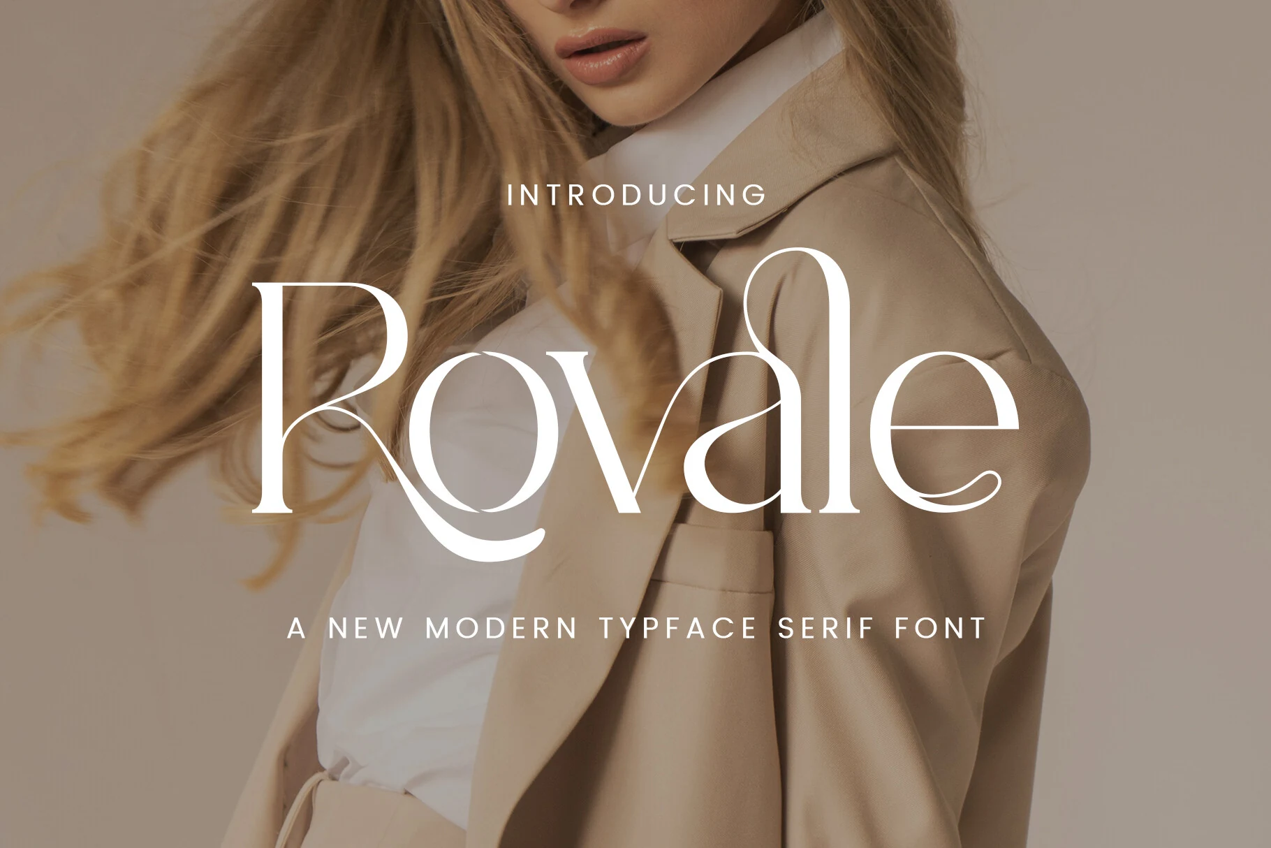 Rovale Font preview with elegant white serif lettering, fine contrast, and sweeping curves