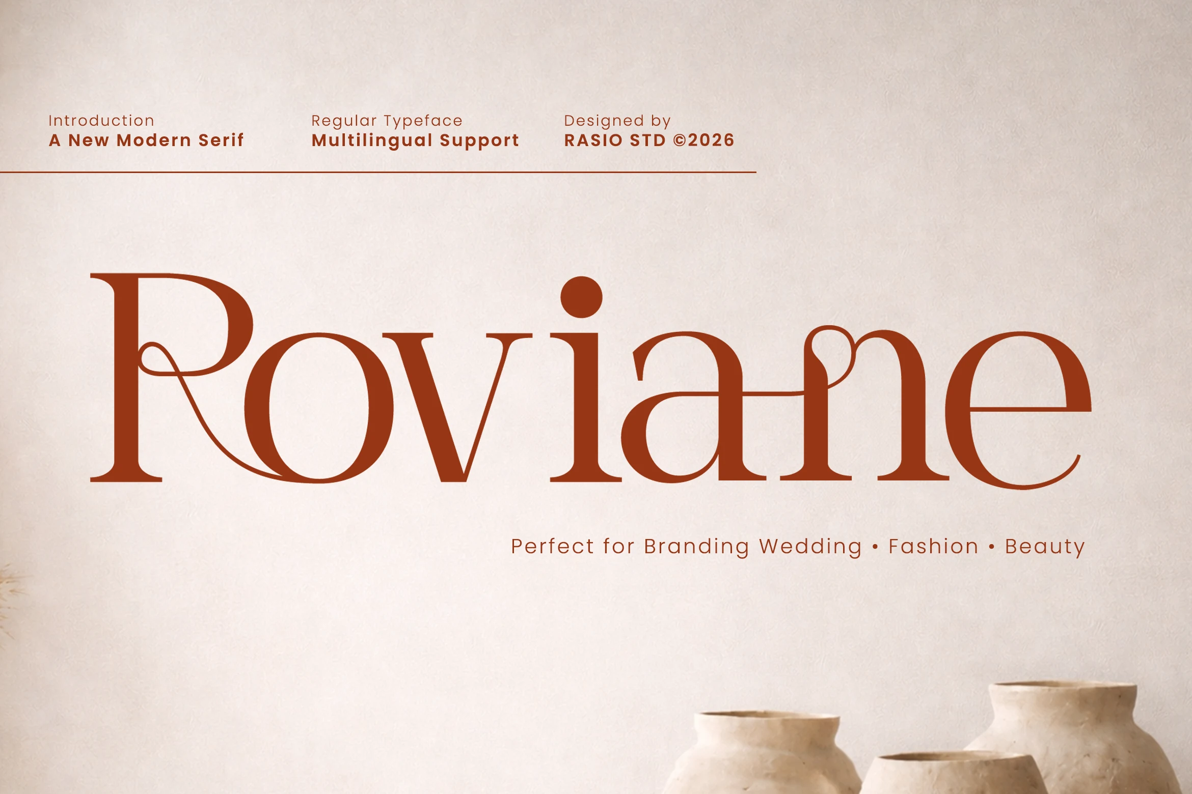 Roviane Font preview with warm brown serif lettering, sweeping curves, and interlocking ligature details