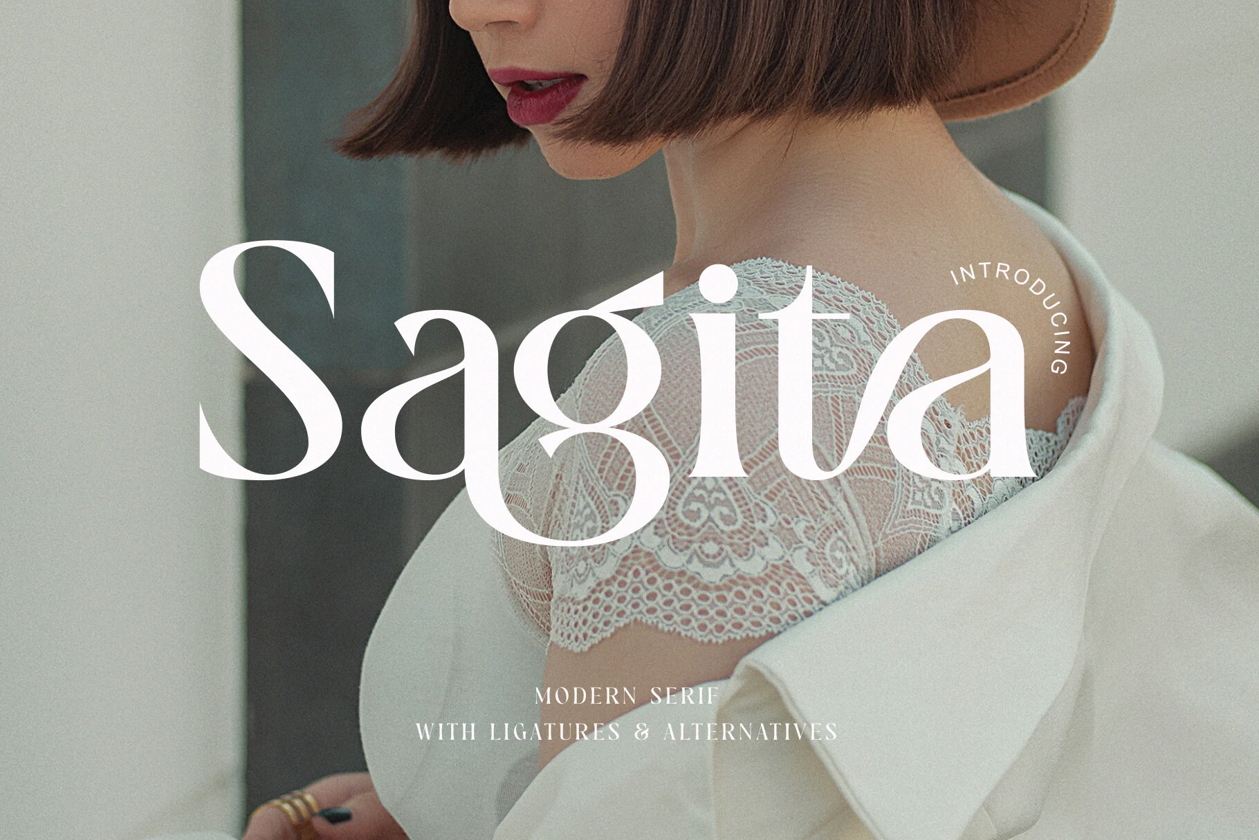 Sagita Font preview with elegant white modern serif lettering, high contrast, and soft curved forms