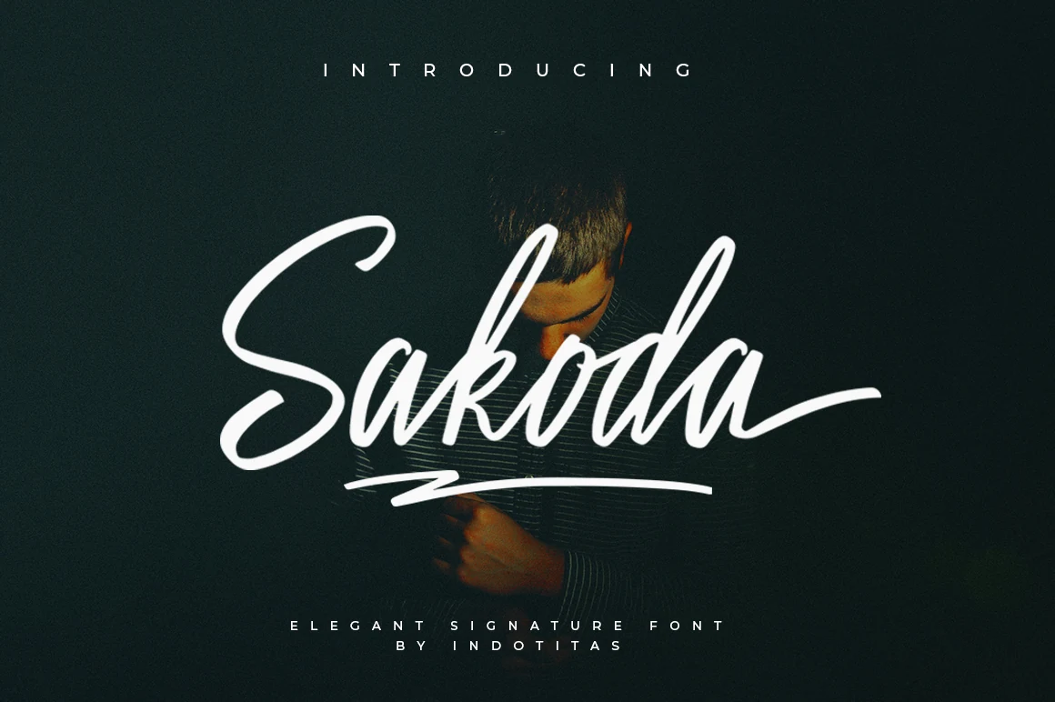 Sakodota Font preview with white bold signature script, looped capital S, and underline stroke