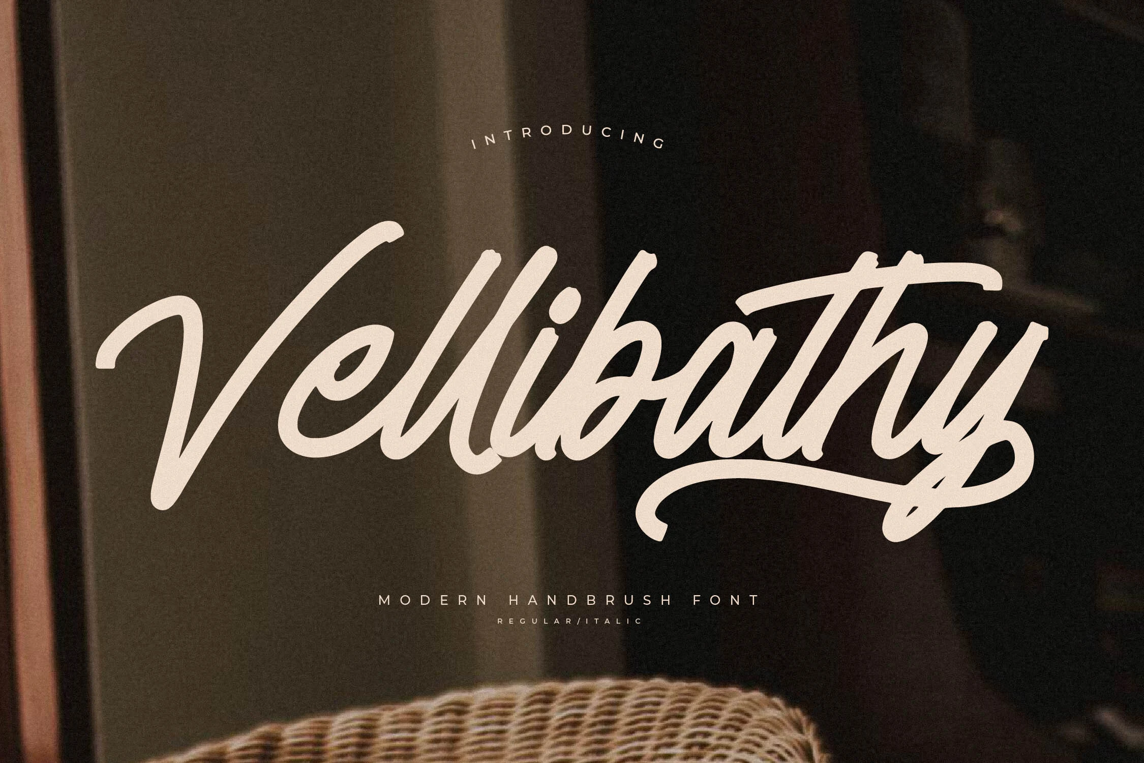 Vellibathy Font preview in bold cream brush script with rounded lettering and a sweeping underline swash