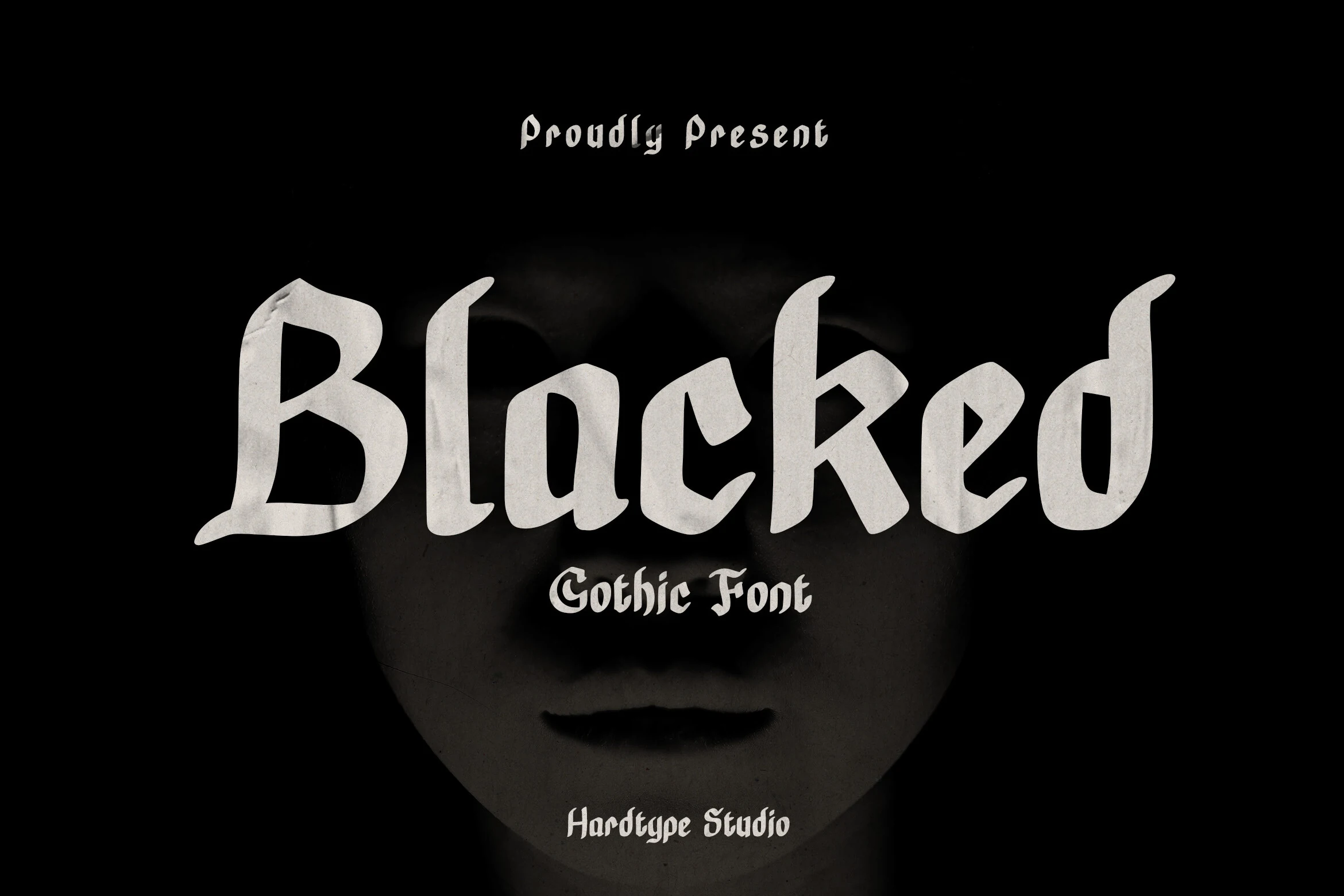 Blacked Font, an upright blackletter display typeface with heavy angular strokes, pointed terminals, and high contrast.