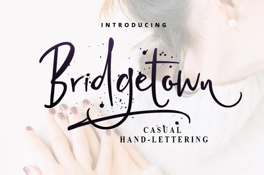 Bridgetown Font featuring a casual connected script with high-contrast strokes, ink splatter details, and a sweeping baseline swash.
