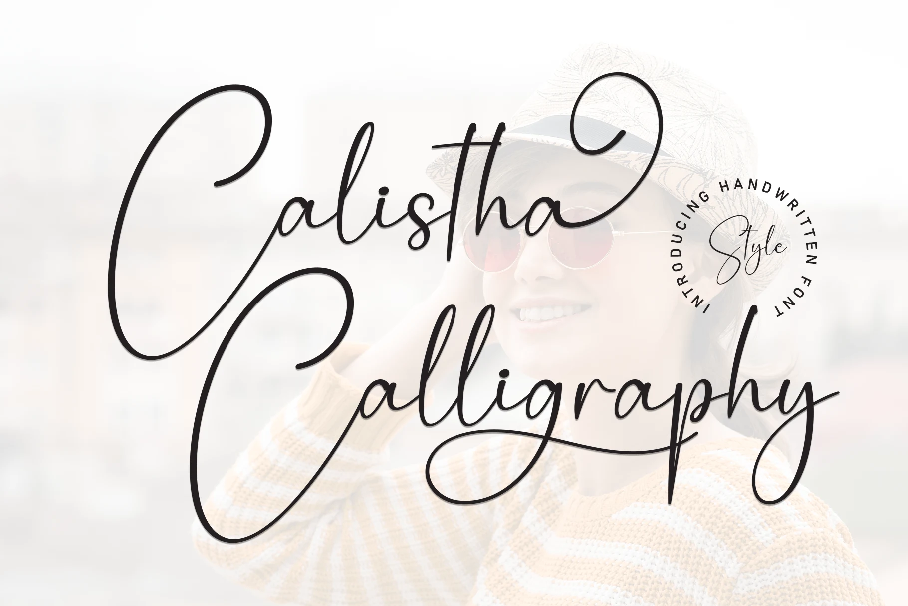 Calistha Calligraphy Font in a sweeping connected script with high stroke contrast and pronounced swashes.