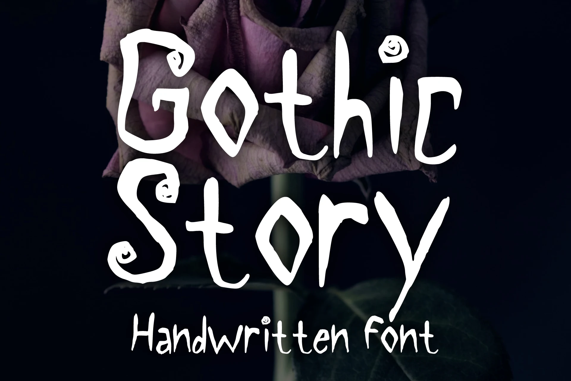 Gothic Story Font in a bold hand-drawn style with irregular strokes and curled terminal flourishes.