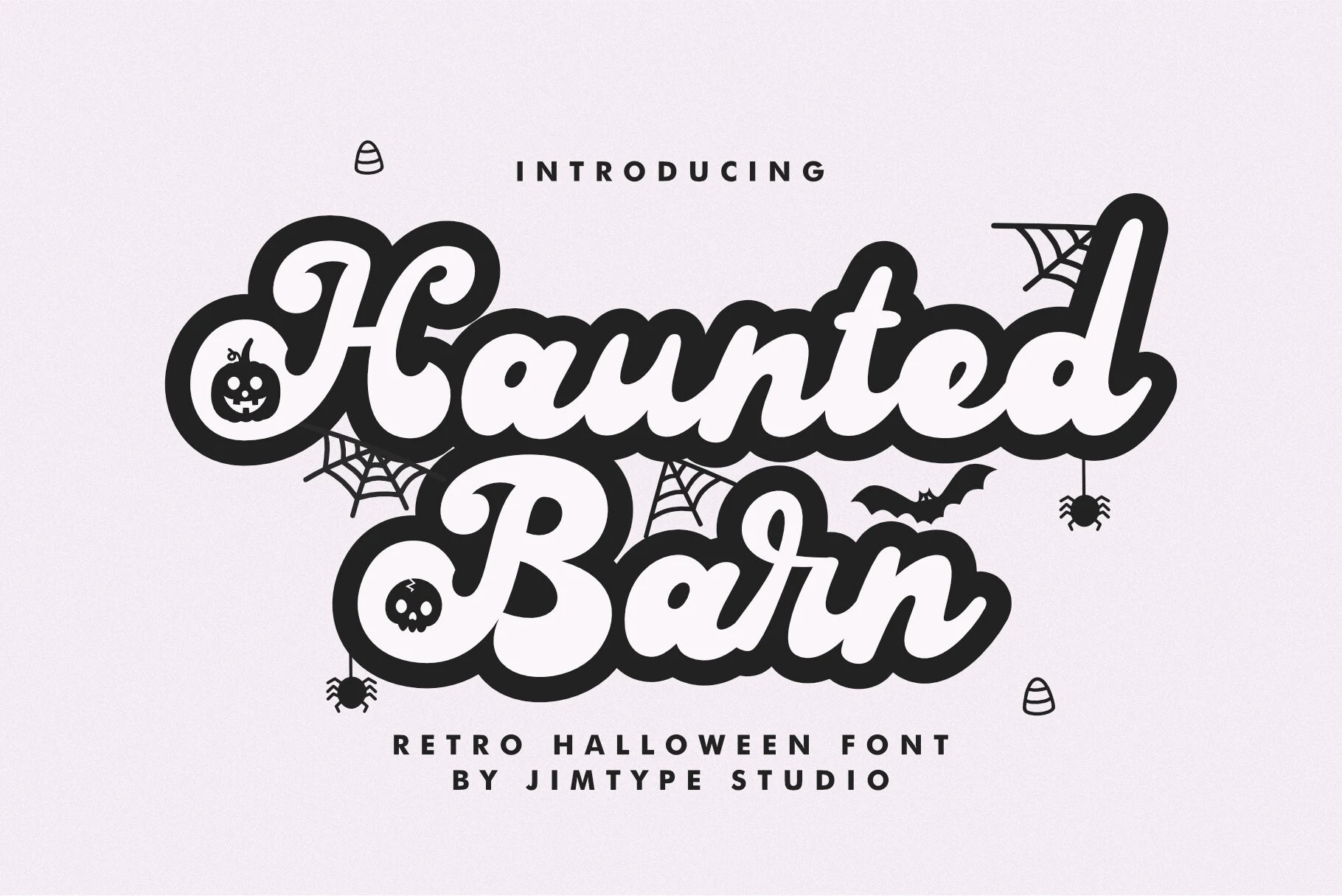 Haunted Barn Font is a bold connected script with exaggerated loops, swirls, and rounded terminals.