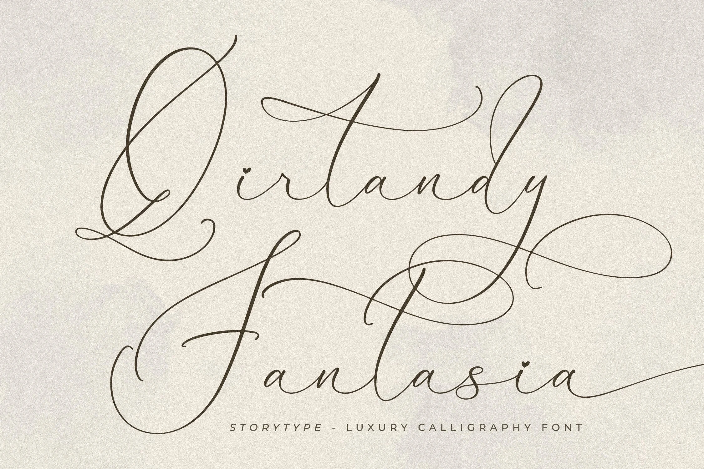 Qirtandy Fantasia Font features a high-contrast connected calligraphy script with sweeping swashes and heart-shaped i dots.