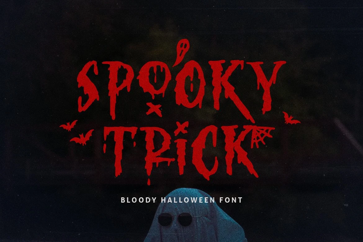 Spooky Trick Font featuring heavy upright horror lettering with dripping edges and distressed outlines