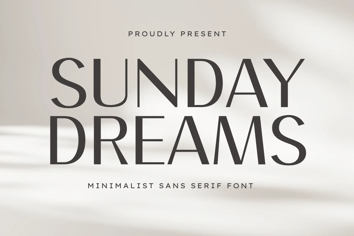 Sunday Dreams Font displayed in upright high-contrast sans serif lettering with thin horizontal strokes and thick vertical strokes.