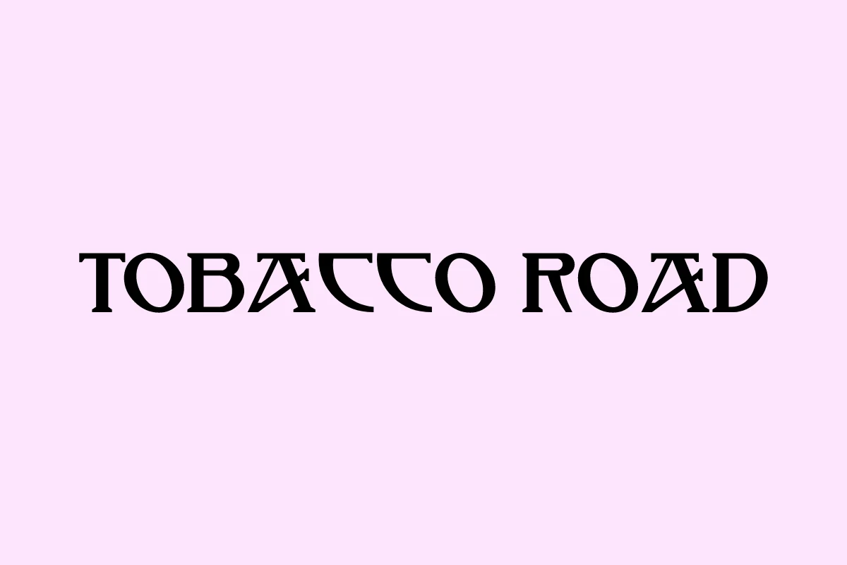 Tobacco Road Font showing stylized high-contrast serif lettering with angular serifs and stencil-style cutouts.