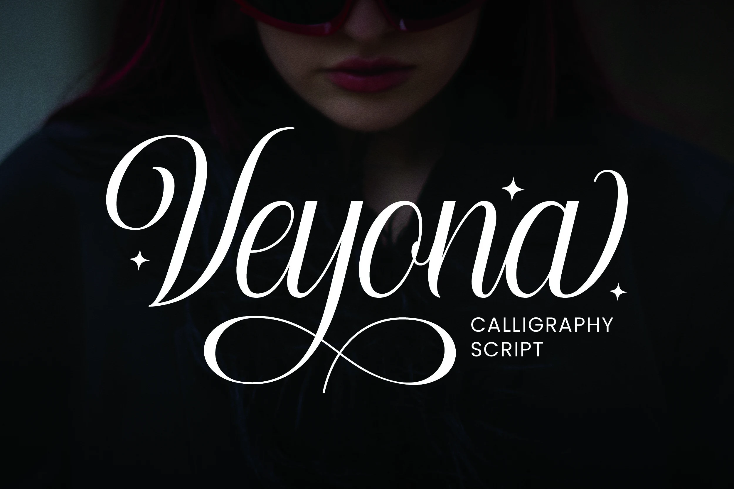 Veyona Font is a decorative calligraphy script with connected cursive letters, high stroke contrast, and sweeping swashes.