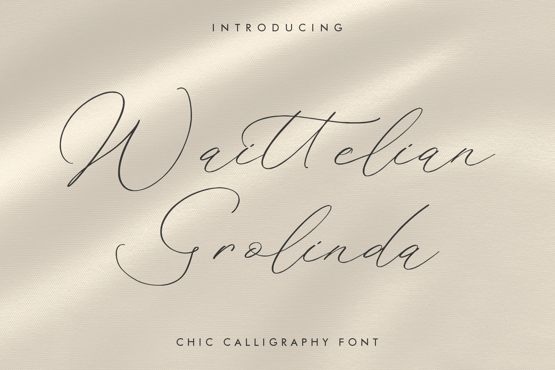Waittelian Grolinda Font shown in connected slanted script with high stroke contrast and decorative swashes.